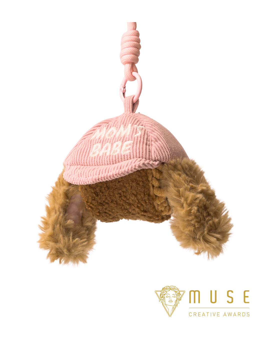 Pink CLIK compact travel dog enrichment toy with pink clip and layered treat pocket, winner of a MUSE Creative Award