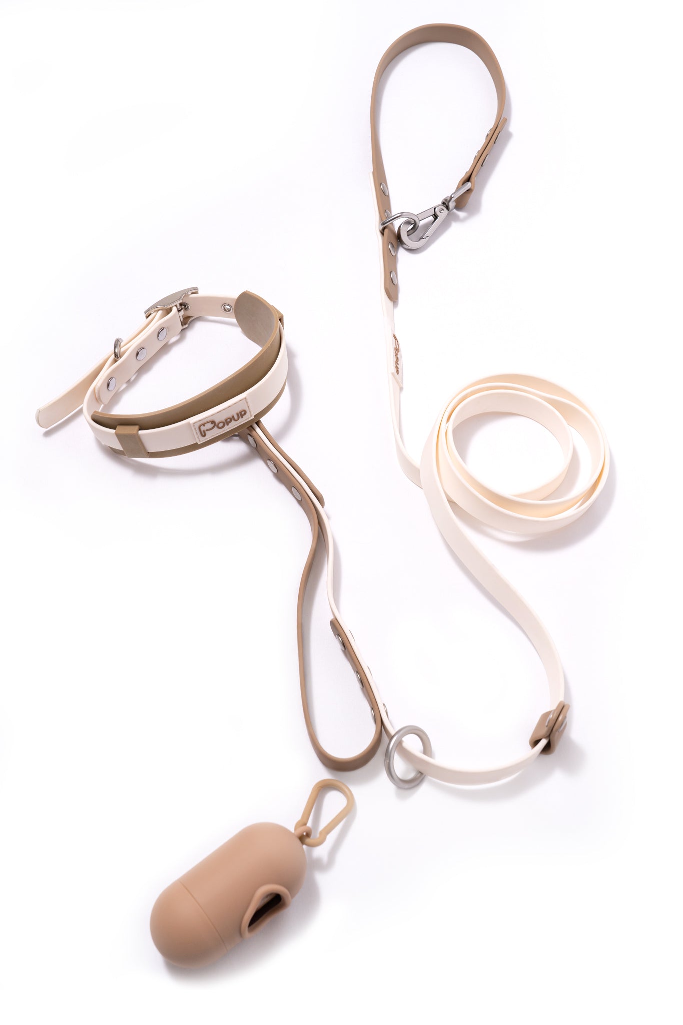 Matching waterproof dog collar and DUO Premium leash with waste bag holder on display