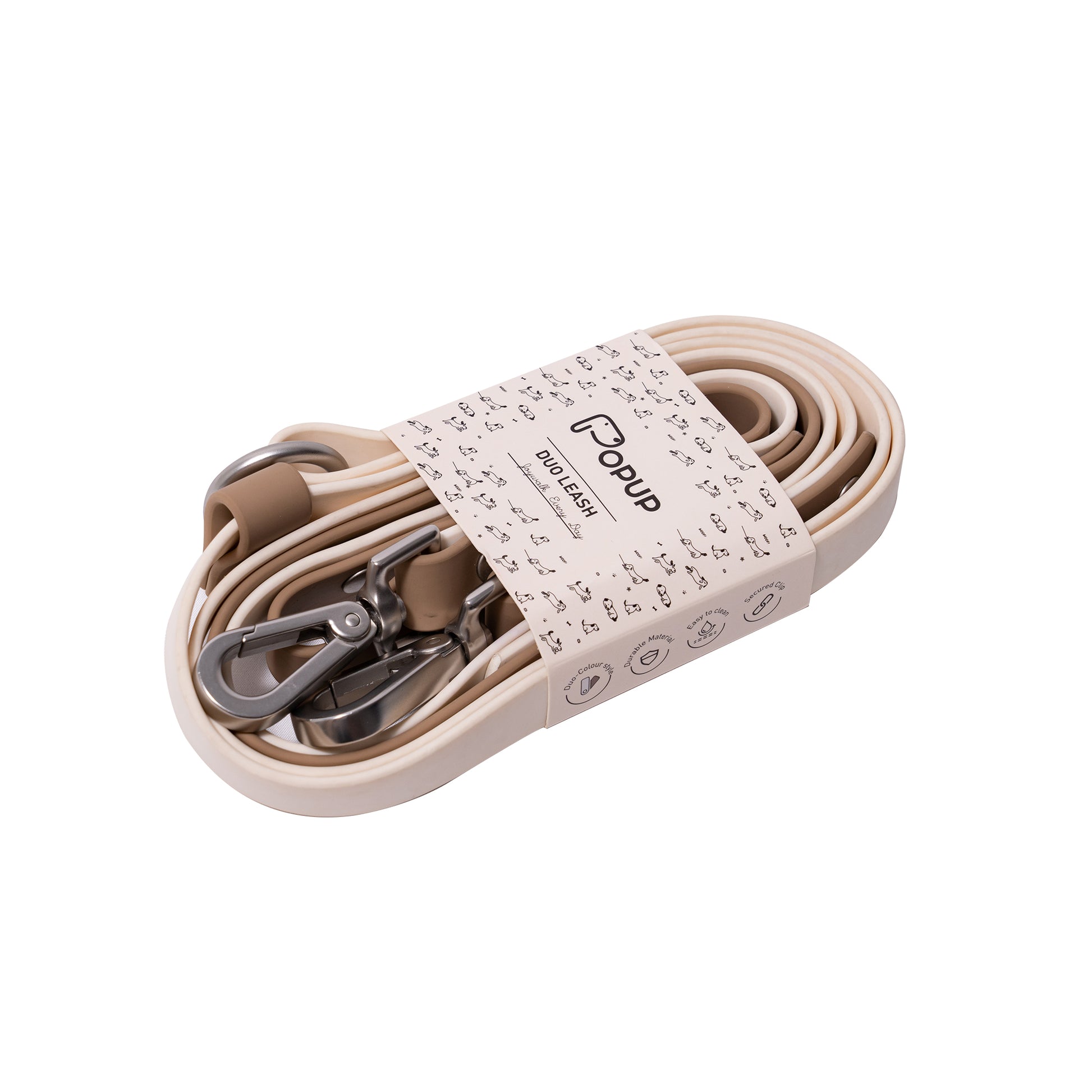 Coiled waterproof dog leash set with chrome clips and slim PVC webbing in neutral tones